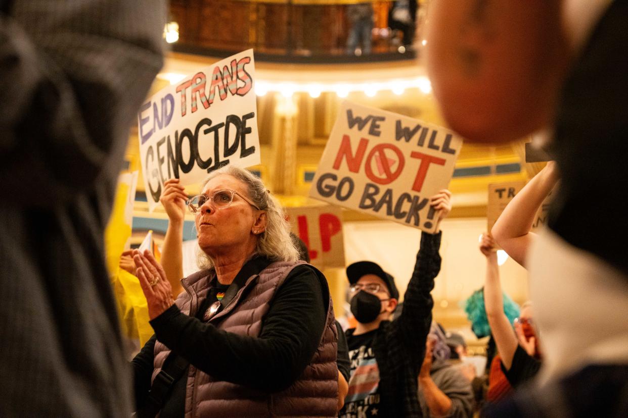 Protesters gather in opposition to HF2389 as lawmakers hold a hearing for the bill that would set legal definitions for the words "man" and "women" Monday, Feb. 12, 2024, at the Iowa State Capitol.