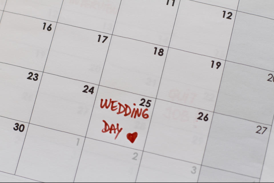 Calendar with the date marked as "Wedding Day" with a heart symbol for a reminder