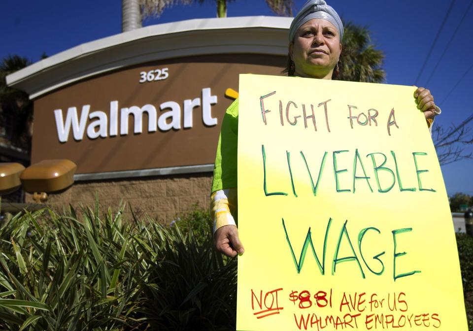 CEO Mike Duke has said that <a href="http://www.huffingtonpost.com/2012/12/12/walmart-ceo-mike-duke_n_2286440.html" target="_blank">Walmart pays "competitive wages," and the company's website <a href="http://corporate.walmart.com/our-story/locations#/united-states" target="_blank">says the average full-time associate makes $12.67 an hour</a>. However, a widely cited 2011 study that looked at data from Glassdoor.com and job listings </a>put <a href="http://www.huffingtonpost.com/2012/12/12/walmart-ceo-mike-duke_n_2286440.html" target="_blank"> that number at about $8.81 an hour</a>. The federal minimum wage is $7.25. 