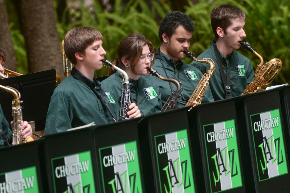 The Choctawhatchee High School Jazz Band entertains the crowd at the town of Shalimar's 75th anniversary celebration Saturday at Combs Park.