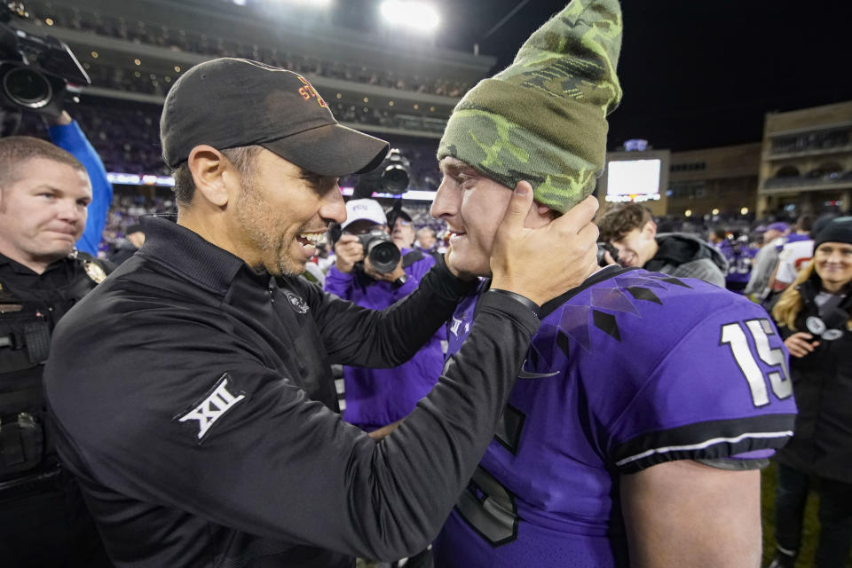 Nov 26, 2022; Fort Worth, Texas, USA; Iowa State Cyclones head coach Matt Campbell talks with TCU Horned Frogs quarterback <a class="link " href="https://sports.yahoo.com/nfl/players/40272" data-i13n="sec:content-canvas;subsec:anchor_text;elm:context_link" data-ylk="slk:Max Duggan;sec:content-canvas;subsec:anchor_text;elm:context_link;itc:0">Max Duggan</a> (15) following a game at Amon G. Carter Stadium. Raymond Carlin III-USA TODAY Sports