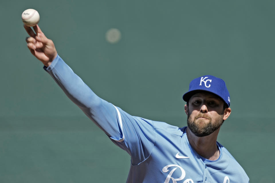 Kansas City Royals starting pitcher Jordan Lyles throws during the first inning of a baseball game against the Minnesota Twins Saturday, April 1, 2023, in Kansas City, Mo. (AP Photo/Charlie Riedel)