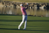 Hudson Swafford hits from the fairway to the 18th hole during the final round of the American Express golf tournament on the Pete Dye Stadium Course at PGA West, Sunday, Jan. 23, 2022, in La Quinta, Calif. (AP Photo/Marcio Jose Sanchez)