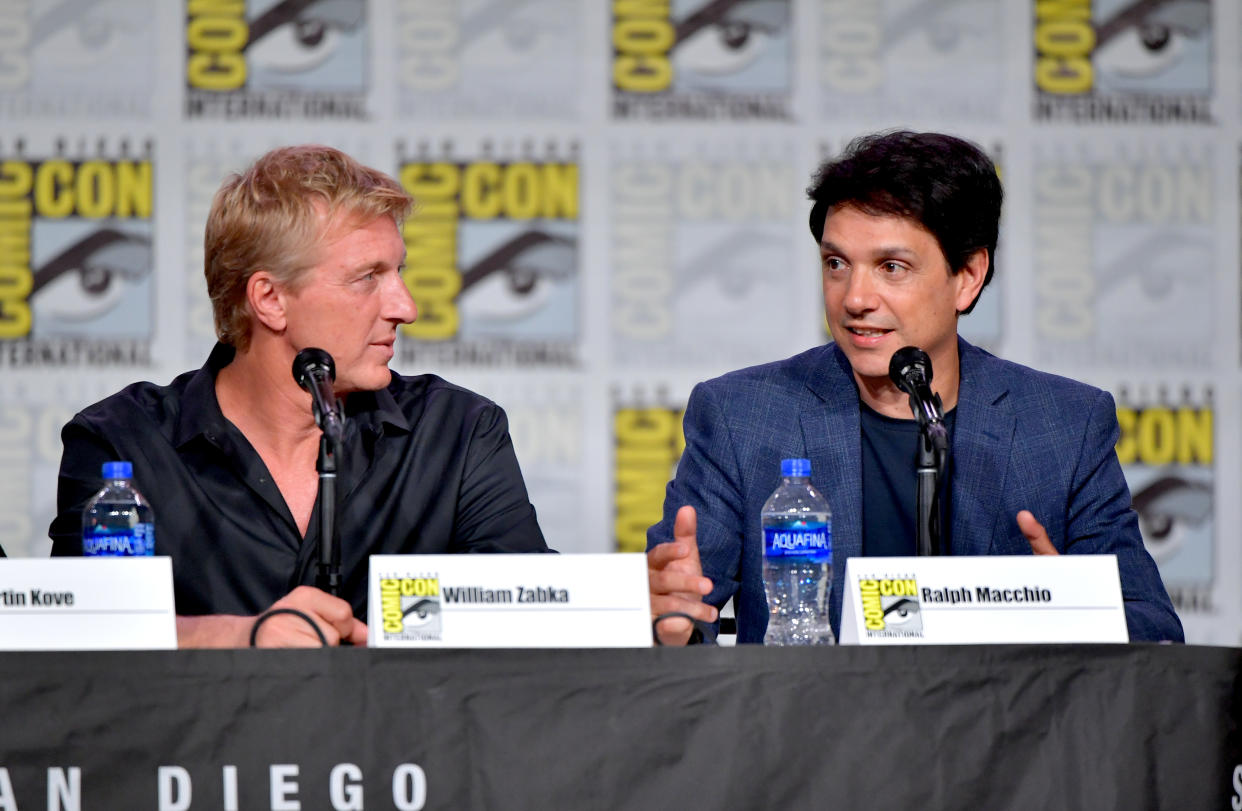 SAN DIEGO, CALIFORNIA - JULY 18: William Zabka and Ralph Macchio speak at the "Cobra Kai: Past, Present, And Future" panel during 2019 Comic-Con International at San Diego Convention Center on July 18, 2019 in San Diego, California. (Photo by Amy Sussman/Getty Images)