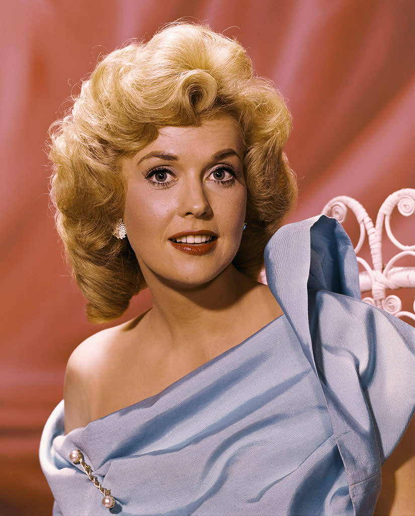 <p>The ‘Beverly Hillbillies’ star was one of two initial recipients of the Miss Golden Globe Award, when it honored rising stars without the familial hook we have today. Douglas won for TV, while now-forgotten actress Eva Six received the award for film. (Photo: Getty Images) </p>