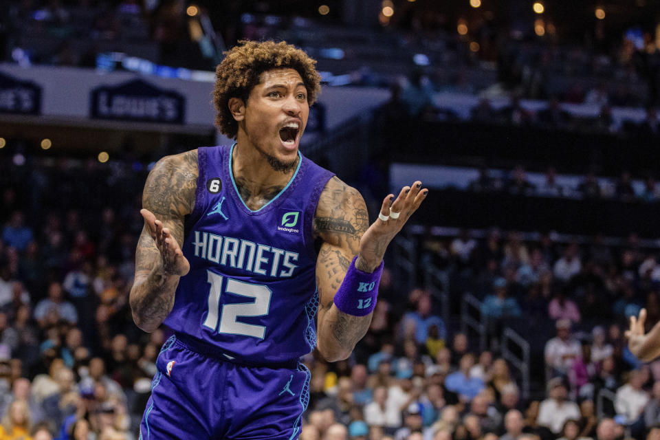 Charlotte Hornets guard Kelly Oubre Jr. (12) reacts to a no call during the first half of an NBA basketball game on Saturday, Oct. 29, 2022, in Charlotte, N.C. (AP Photo/Scott Kinser)