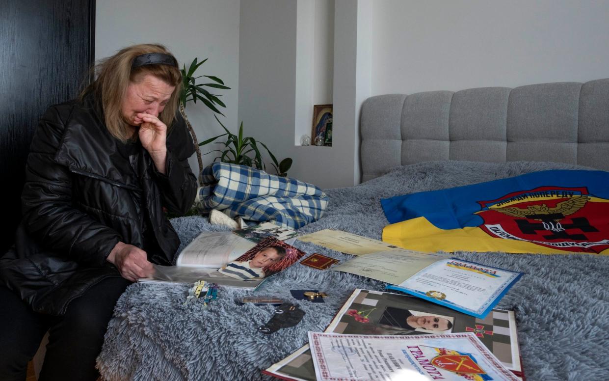 Maria Pavlovych mourns her son, Roman, who was killed near Mariupol - AP