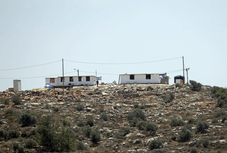 The the newly established Jewish outpost of Eviatar is seen from the Palestinian village of Beita, south of the West Bank city of Nablus, Monday, June 14, 2021. Israel’s new government faces an early test in deciding whether to evacuate dozens of Israeli families from Eviatar, that was established last month without the permission of Israeli authorities on land the Palestinians say is privately owned. (AP Photo/Majdi Mohammed)