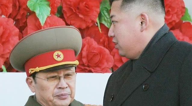 Jang Song Thaek (left) with his nephew and North Korean leader Kim Jong-Un before his execution. Photo: AP.