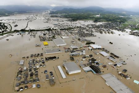 An aerial view shows submerged houses and facilities at a flooded area in Kurashiki, southern Japan, in this photo taken by Kyodo July 7, 2018. Mandatory credit Kyodo/via REUTERS