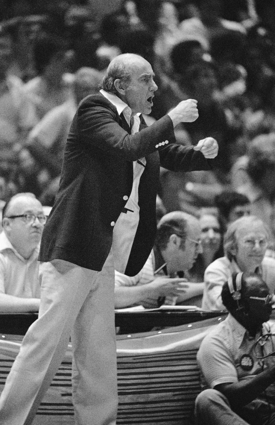 FILE - In this May 22, 1977, file photo, Portland Trail Blazers head coach Jack Ramsay signals to his team late in an NBA basketball game against the 76ers in Philadelphia. Ramsay, a Hall of Fame coach who led the Portland Trail Blazers to the 1977 NBA championship before he became one of the league's most respected broadcasters, has died following a long battle with cancer. He was 89. (AP Photo/File)
