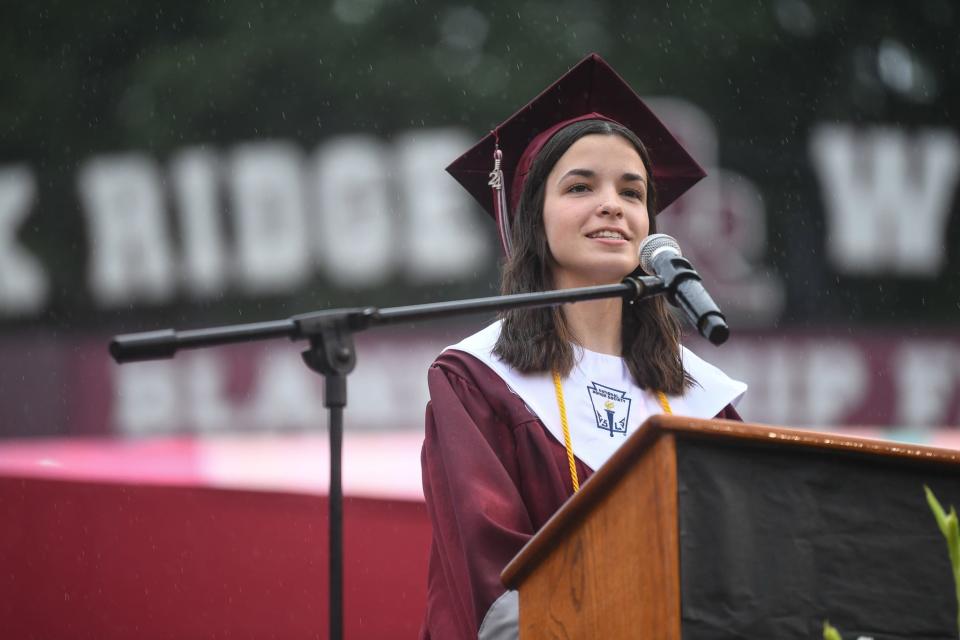 Meghan Reazer speaks during Oak Ridge High School's graduation ceremony at Blankenship Field, Friday, May 17, 2024.
