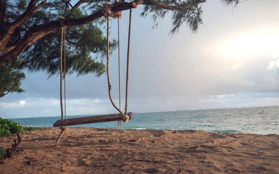 On a sticky-hot December day on the North Shore of Hawaii, thousands of fans gathered along the beach to watch their favorite surfers get barrelled in the pounding surf. The famed Pipeline break was firing that day, with waves mercilessly crashing on shore — but even the noise of the ocean was...