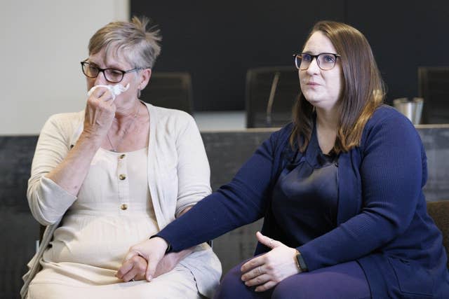 Chris Hutchinson, 60, mother, and Nina Hutchinson, 32, sister, of Gaby Hutchinson, 23, who died following the crowd crush (Belinda Jiao/PA)