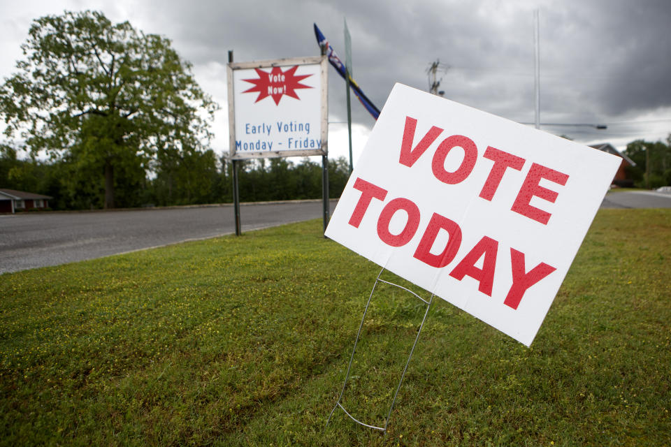 In this May 20, 2020, file photo, signage is seen near the road at the West Side Voting Precinct in Rossville, Ga. (C.B. Schmelter /Chattanooga Times Free Press via AP)