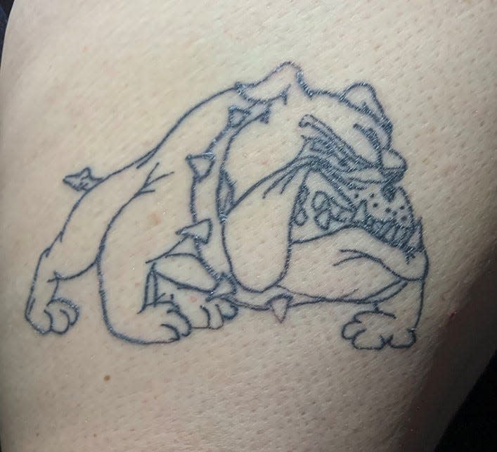 One of Brianna Soto's tattoos is of a bulldog.