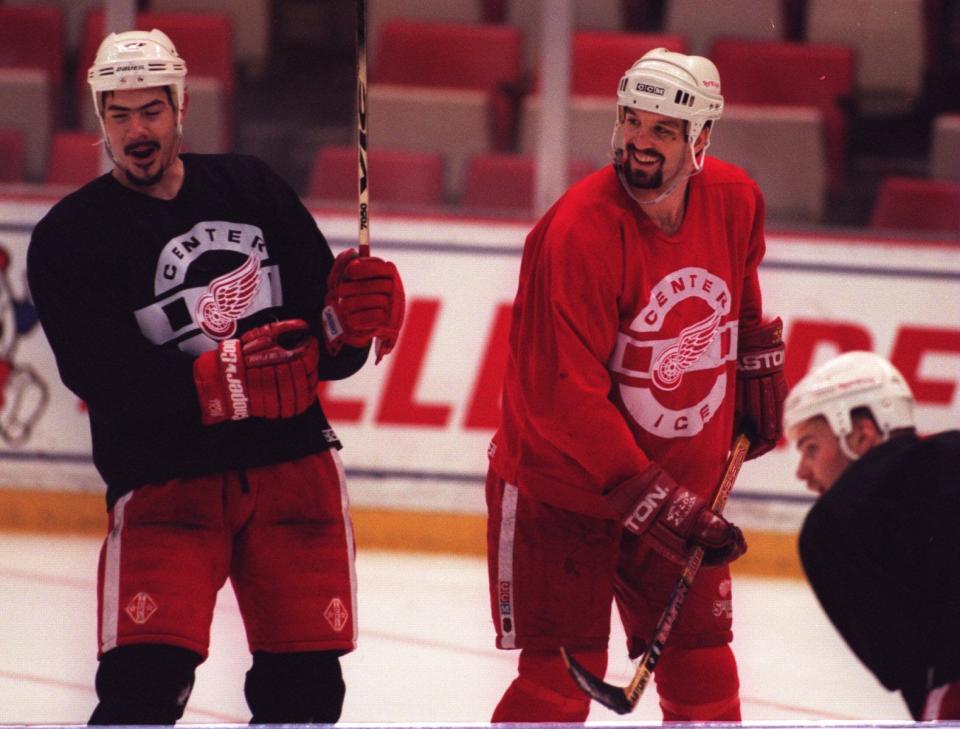 Detroit Red Wings' Jamie Pushor, left, and Brendan Shanahan laugh near the end of practice at Joe Louis Arena, May 28, 1997.