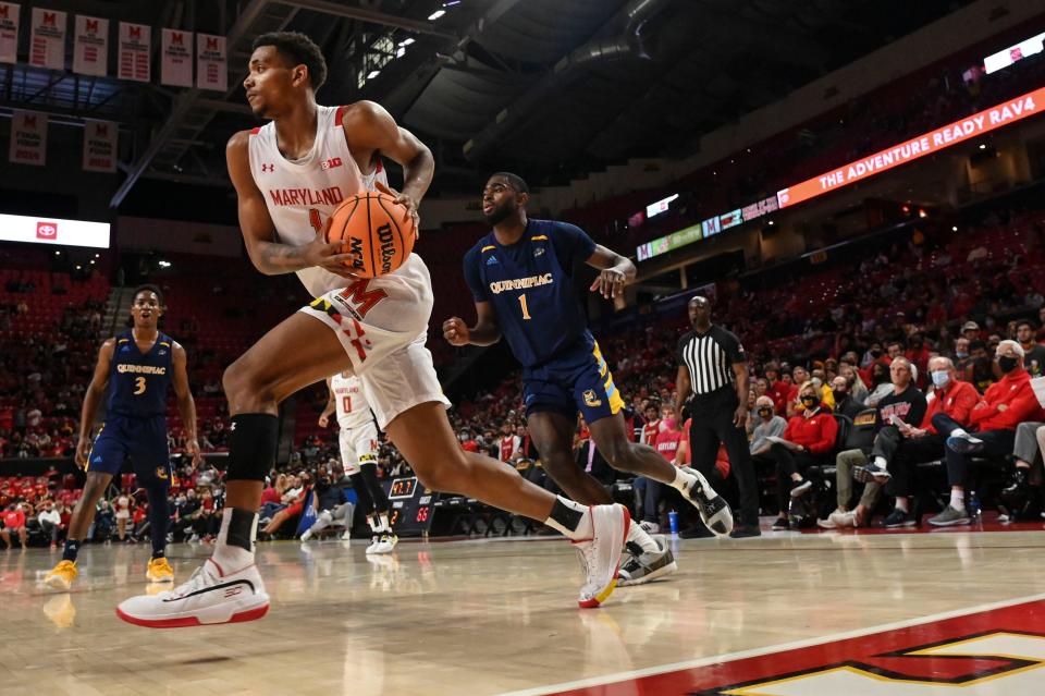 Nov 9, 2021; College Park, Maryland, USA; Maryland Terrapins guard James Graham III (1) makes a move to the basket as Quinnipiac Bobcats guard Tymu Chenery (1) defends during the game at Xfinity Center. Mandatory Credit: Tommy Gilligan-USA TODAY Sports