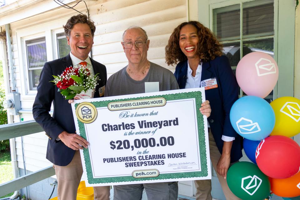 (Center) Columbia resident Charles Vineyard claims his $20,000 prize from Publishers Clearing House. Prize patrol members Howie Guja and Loren Williams surprised Vineyard on Thursday, June, 9, 2022, in Columbia, Tennessee.