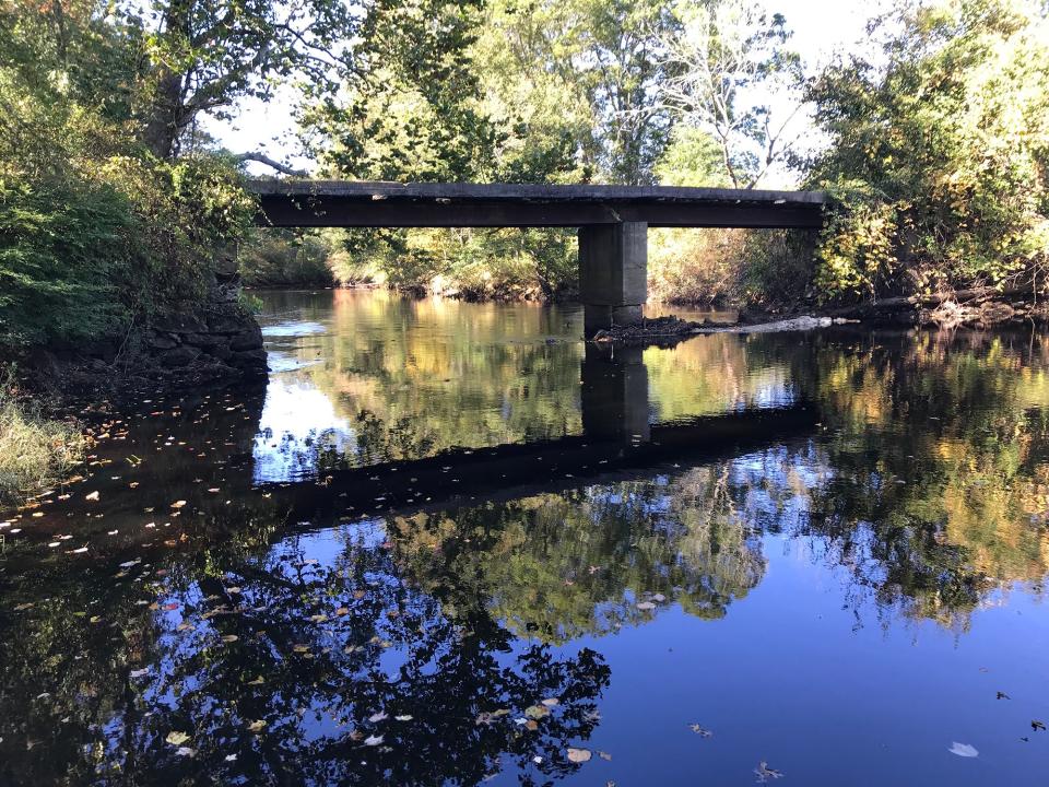 A cement bridge supported by an iron beam crosses the Pawcatuck River at Potter Hill Landing in Westerly.