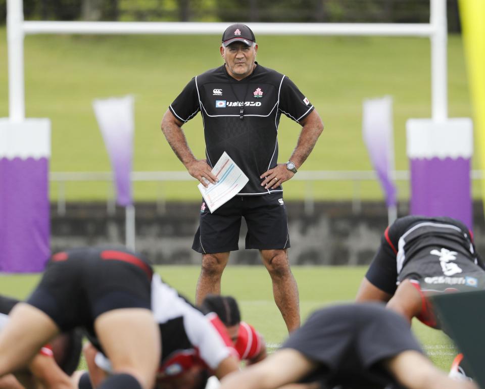 Japan's head coach Jamie Joseph watches his team's training in Hamamatsu, central Japan, Tuesday, Sept. 24, 2019. Japan plays Ireland on Saturday at the Rugby World Cup in Japan. (Kyodo News via AP)