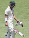 Australia's Matthew Wade walks from the field after he was dismissed without scoring during play on day four of the fourth cricket test between India and Australia at the Gabba, Brisbane, Australia, Monday, Jan. 18, 2021. (AP Photo/Tertius Pickard)