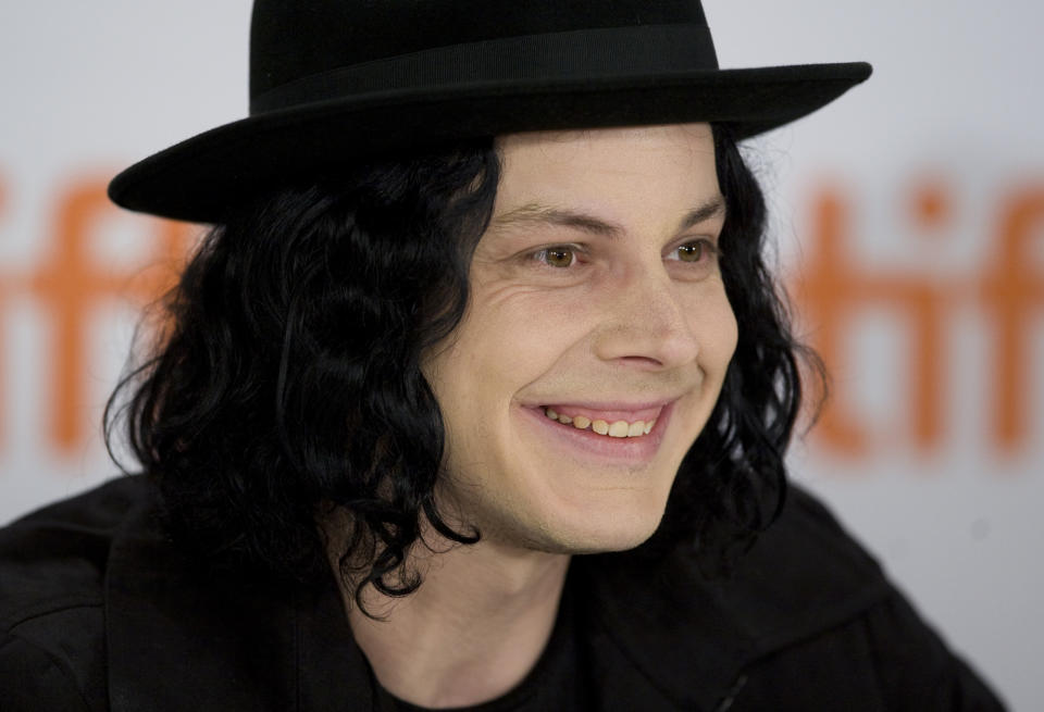 FILE - This Sept. 18, 2009 file photo shows musician Jack White taking part in a news conference in Toronto. The operators of Detroit’s historic Masonic Temple announced Tuesday, June 4, 2013, that White made a $142,000 donation to cover the delinquent tax bill for the prominent music venue that has hosted such groups as The Who and the Rolling Stones over the decades. (AP Photo/The Canadian Press, Darren Calabrese)