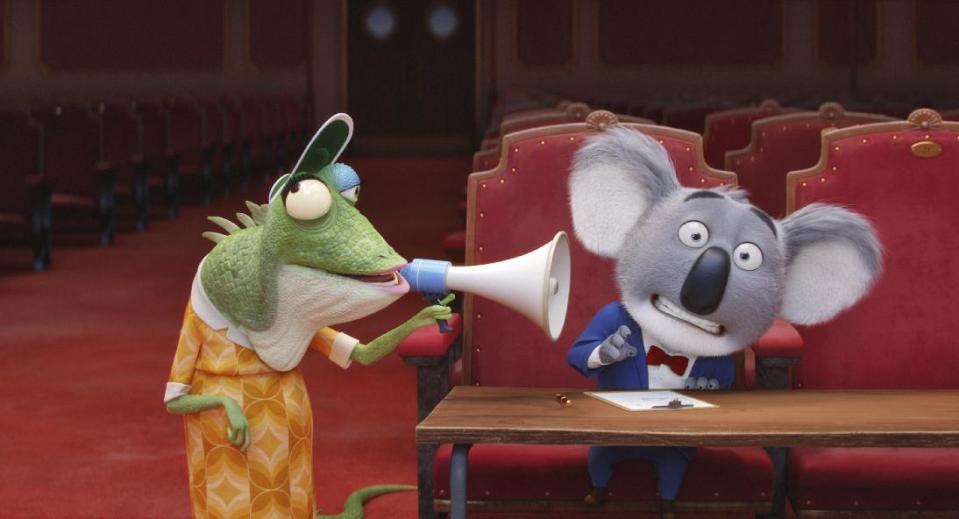 This image released by Universal Pictures shows characters Buster, voiced by Matthew McConaughey, right, and Miss Crawly, voiced by Garth Jennings from the animated film, "Sing." (Universal Pictures via AP)