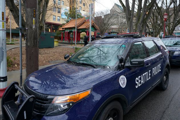 A Seattle Police Department vehicle sits parked at Hing Hay Park in the heart of Seattle's Chinatown-International District, March 18, 2021. A police watchdog agency is investigating a Seattle officer after he was caught on audio mocking the January 2023 death of a young woman who was hit by a speeding police cruiser.