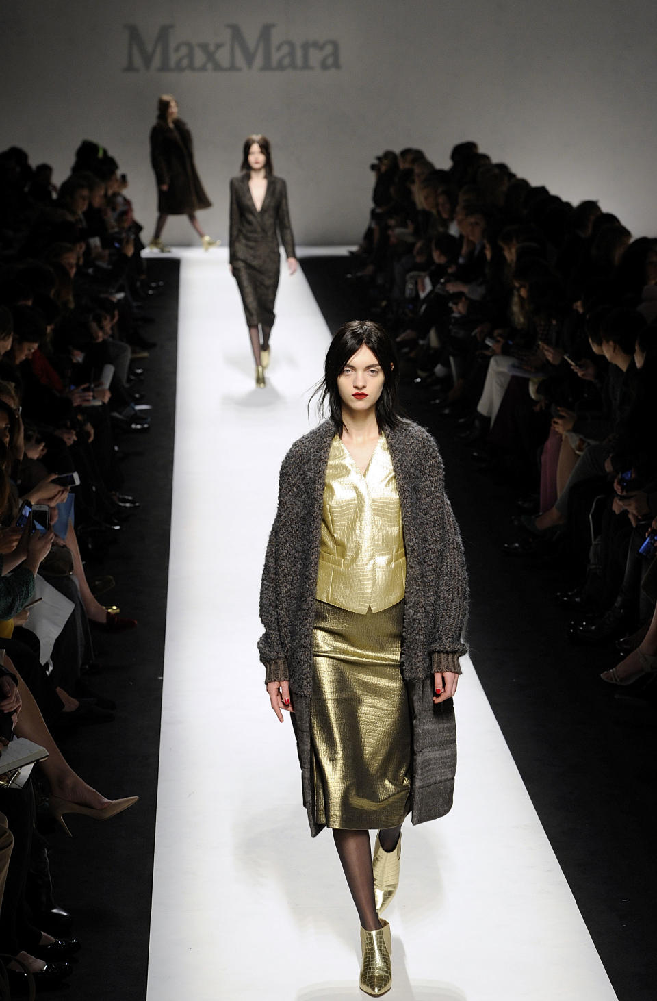 A model wears a creation for Max Mara women's Fall-Winter 2014-15 collection, part of the Milan Fashion Week, unveiled in Milan, Italy, Thursday, Feb. 20, 2014. (AP Photo/Giuseppe Aresu)