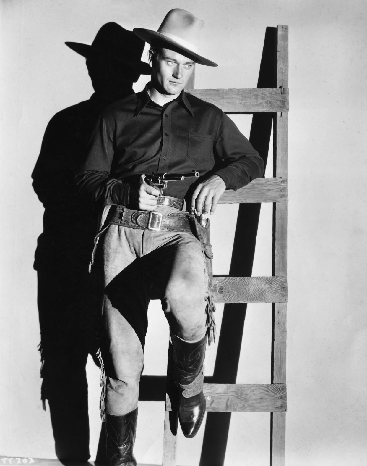 John Wayne as John Trent in The Telegraph Trail.<span class="copyright">Corbis/Getty Images</span>