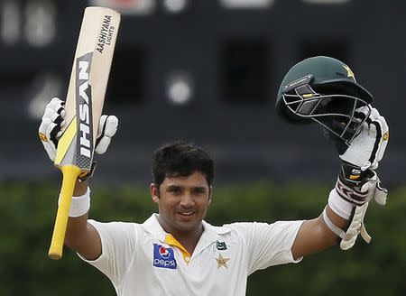 Pakistan's Azhar Ali celebrates his century during the fourth day of their second test cricket match against Sri Lanka in Colombo June 28, 2015. REUTERS/Dinuka Liyanawatte