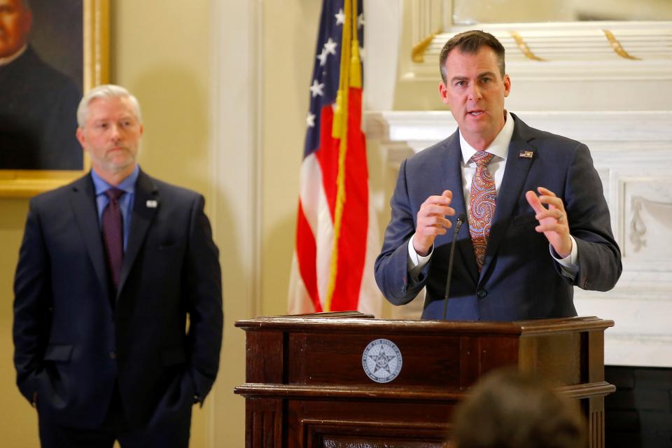 Gov. Kevin Stitt speaks during a news conference Tuesday inside the state Capitol, about actions the state will take to assist schools suffering from staff shortages.