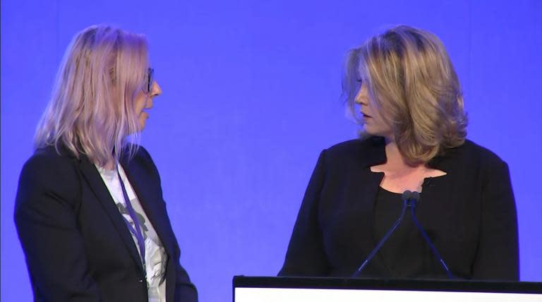 Protester confronts Penny Mordaunt for 'silencing women trying to speak out about sex abuse by aid workers'