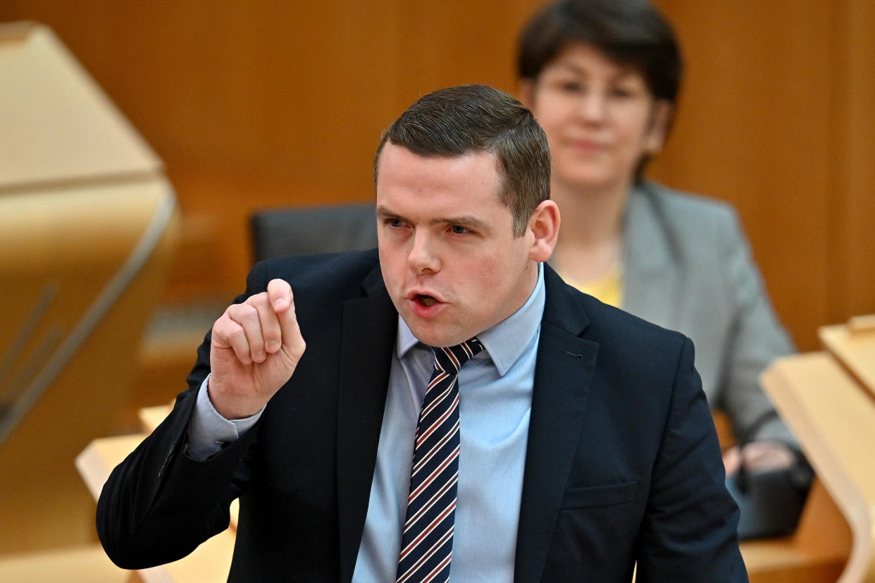 Scottish Conservative leader Douglas Ross pressed the First Minister on her plans (Jeff J Mitchell/PA)