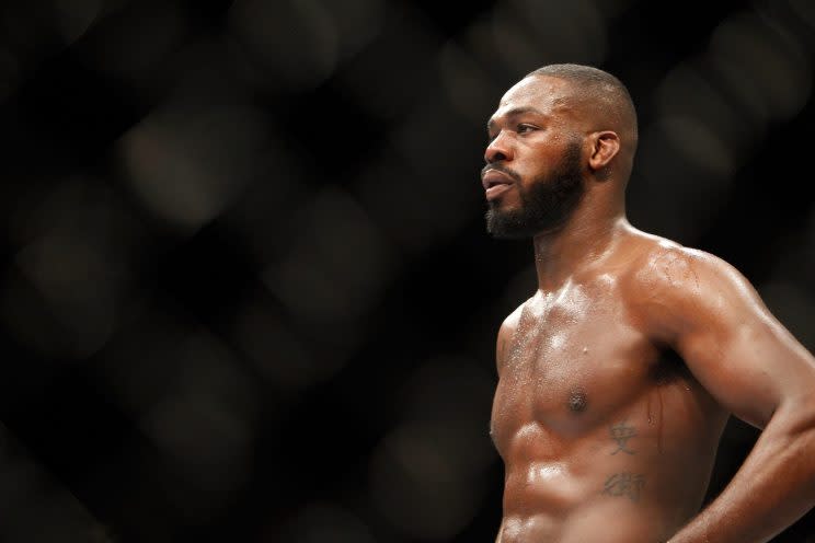 Jon Jones looks on while he defends his title against Daniel Cormier at UFC 182. (Getty)