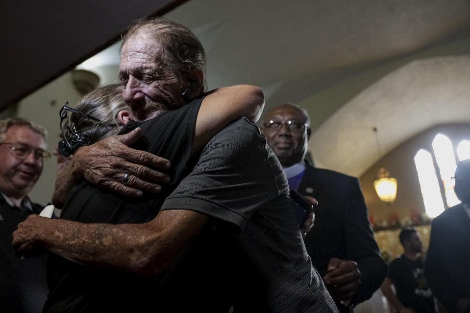 Overwhelmed: Mr Basco greets a well wisher at the memorial for his companion of 22 years (GETTY)