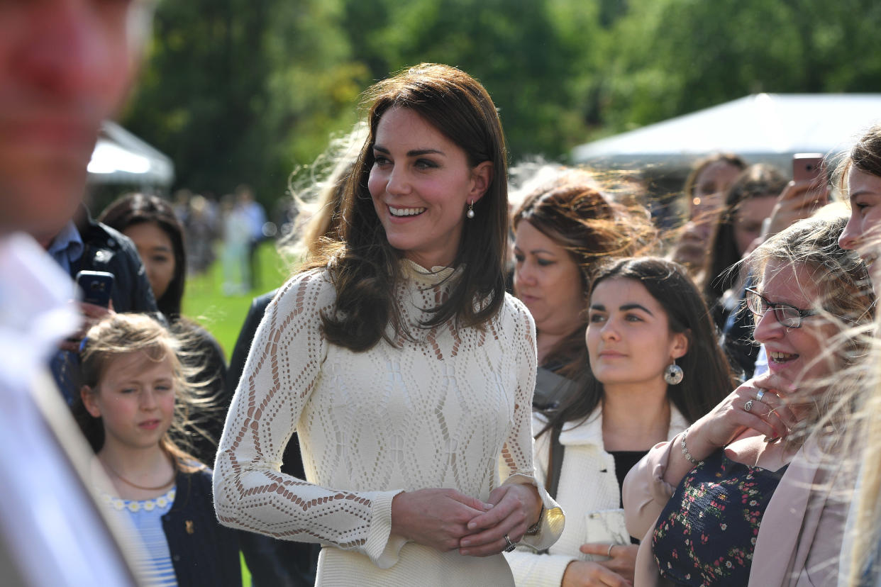 Some people have criticized Kate Middleton for taking time off after a two-week hospital stay for abdominal surgery. (Photo by Andrew Parsons - WPA Pool/Getty Images) LONDON, UNITED KINGDOM - MAY 13: Catherine, Duchess of Cambridge meets guests at a tea party in the grounds of Buckingham Palace to honour the children of those who have died serving in the armed forces on May 13, 2017 in London, England. (Photo by Andrew Parsons - WPA Pool/Getty Images)