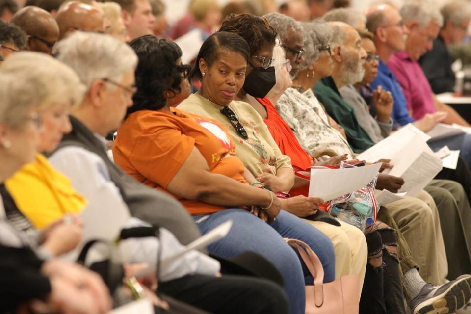 Attendees talk during the BUILD’s 2024 Nehemiah Action Assembly at the Central Bank Center in Lexington, Ky on April 30, 2024.