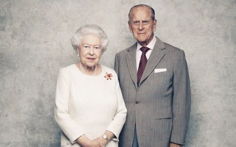 Queen Elizabeth II and Prince Philip pose for a photo in celebration of their platinum wedding anniversary - Credit: Getty