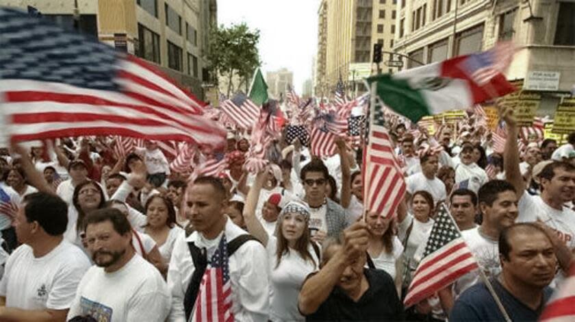 Immigrants and supporters gather at a march in 2006.