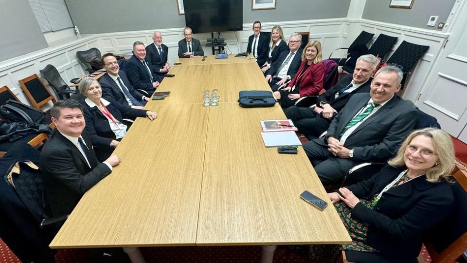 Council of Ministers of Jersey sitting around a meeting table