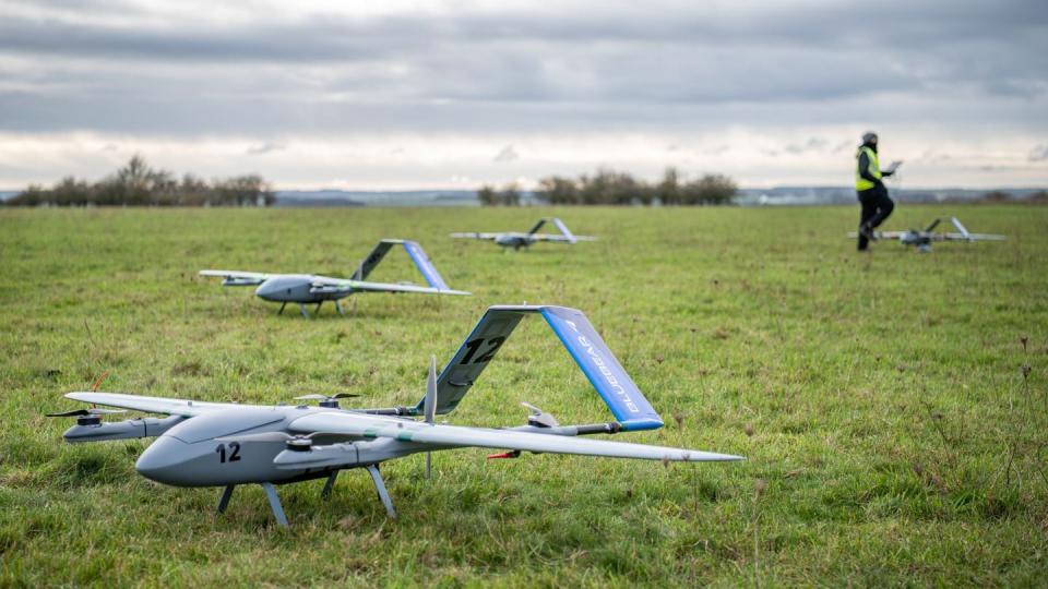 A handful of Blue Bear drones are seen in a field during artificial intelligence and autonomy testing among AUKUS partners in April 2023. (Photo provided/U.K. Ministry of Defence)