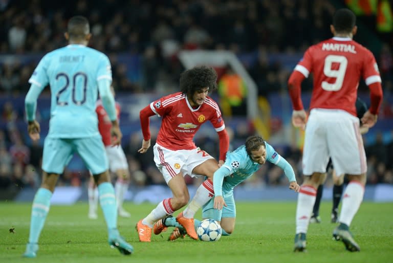 Manchester United's Marouane Fellaini (2nd L) may earn a recall to bolster United's attacking options after scoring for the club's under-21 side this week