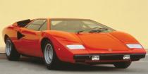 <p>The word "countach" roughly translates to "oh my!", which is what most people will say when they see one drive by. <a href="https://www.ebay.com/itm/1990-Lamborghini-Countach-25th-Anniversary/392653326951?hash=item5b6bf64a67:g:kT8AAOSwkEFeK4vj" rel="nofollow noopener" target="_blank" data-ylk="slk:Here's a 25th Anniversary Edition;elm:context_link;itc:0;sec:content-canvas" class="link ">Here's a 25th Anniversary Edition</a> you can own right now. </p>