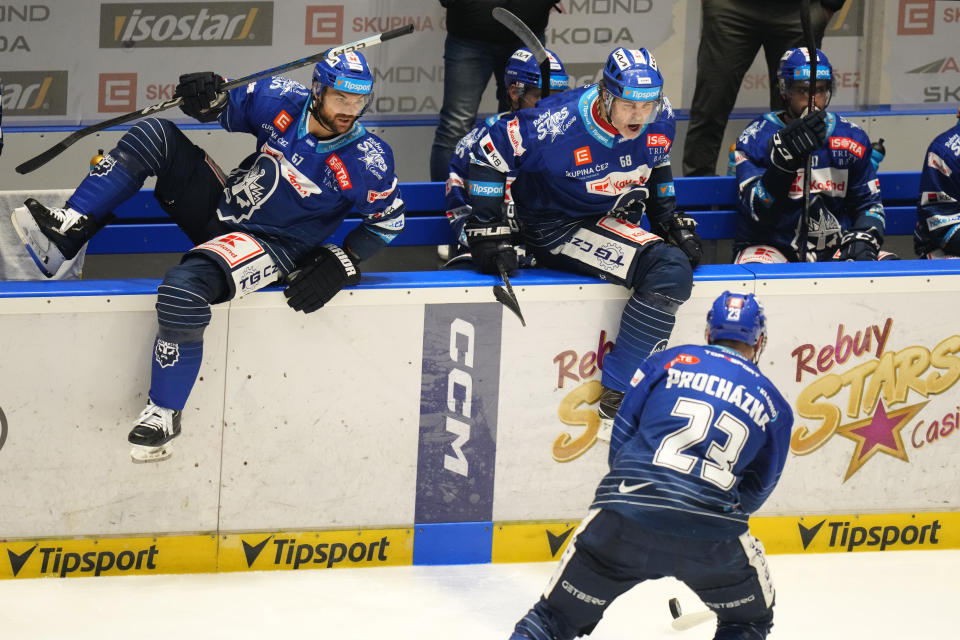 Jaromir Jagr, top center, of Kladno Knights, shouts during the first Czech hockey league match against Ceske Budejovice in Kladno, Czech Republic, Sunday, Jan. 21, 2024. In his 36th season as a professional hockey player, Jagr will take a short break from the Czech league this week and travel to Pittsburgh, where he made his name in the NHL with the Penguins and where his No. 68 jersey will be retired at a ceremony on Sunday. Then it’s quickly back to the Czech Republic to prepare for the next game with the Kladno Knights, who are struggling in last place in the domestic league after a 17-game losing streak. (AP Photo/Petr David Josek)