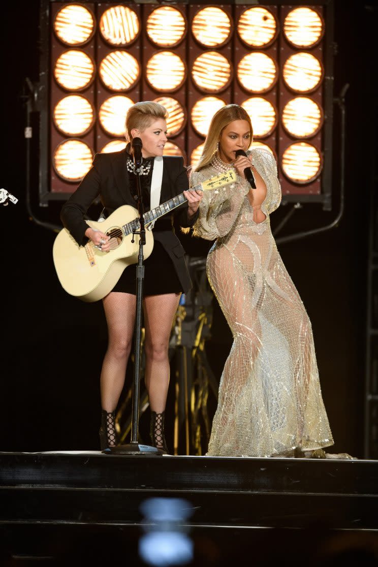 Beyonce and Natalie Maines performing together at the CMA Awards.