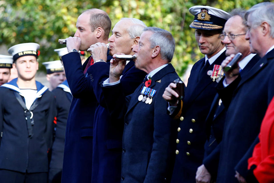 The Duke of Cambridge drinks from a hipflask during the Submariners’ Remembrance Service and Parade, at Middle Temple, London. Photo: Getty Images