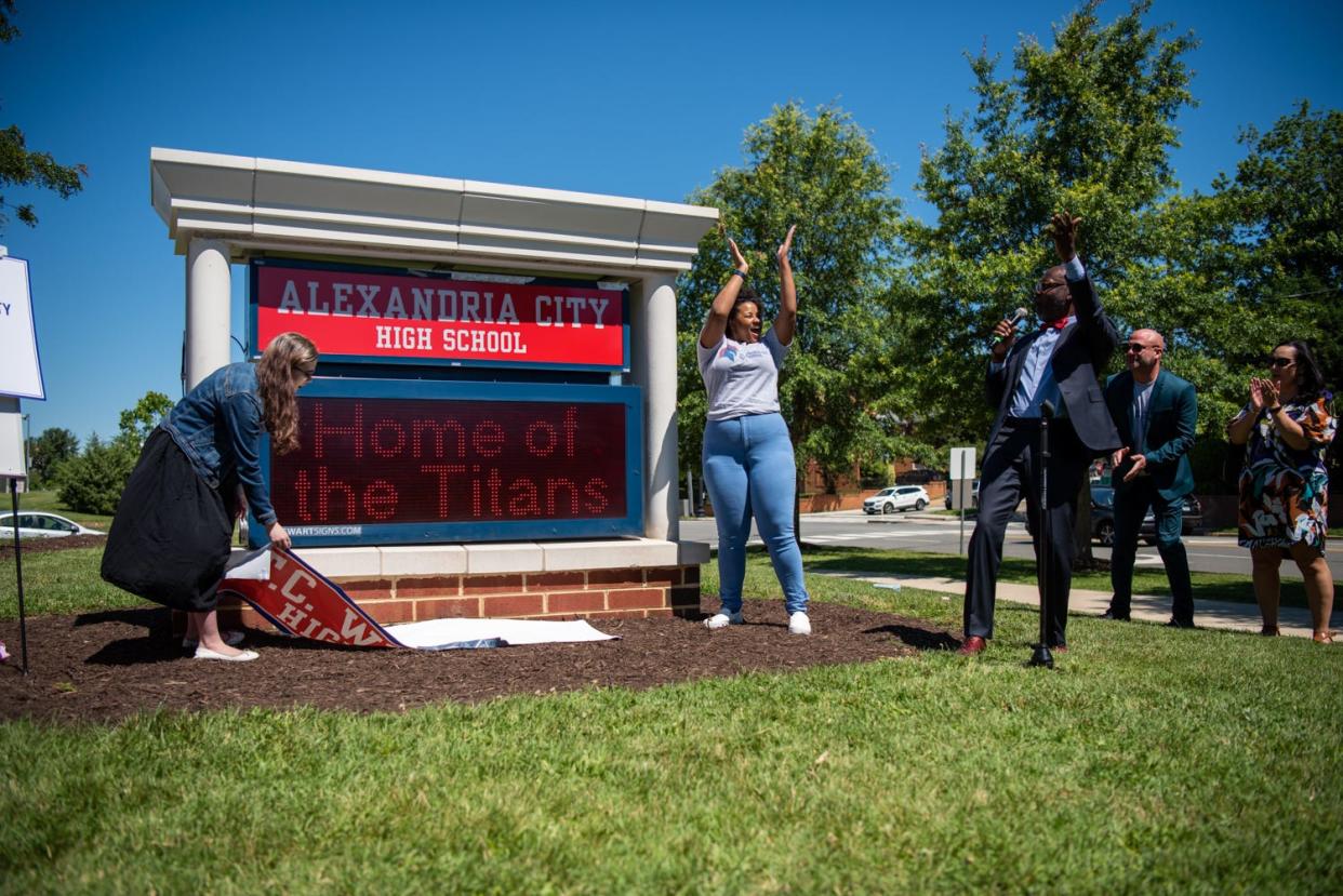 Students and district leaders celebrate the school name change in July 2021.