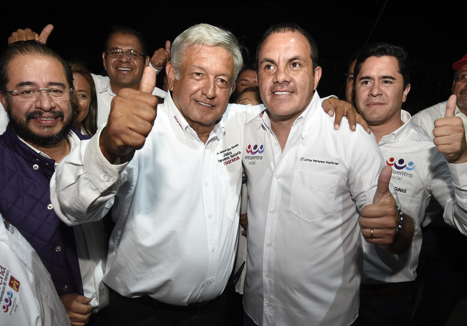 Mexican presidential candidate for the MORENA party, Andres Manuel Lopez Obrador (C-L) and governor candidate for Morelos State, Cuauhtemoc Blanco (C-R) during a campaign rally on June 16, 2018 ahead of the upcoming July 1 election. (Photo by ALFREDO ESTRELLA / AFP)        (Photo credit should read ALFREDO ESTRELLA/AFP via Getty Images)